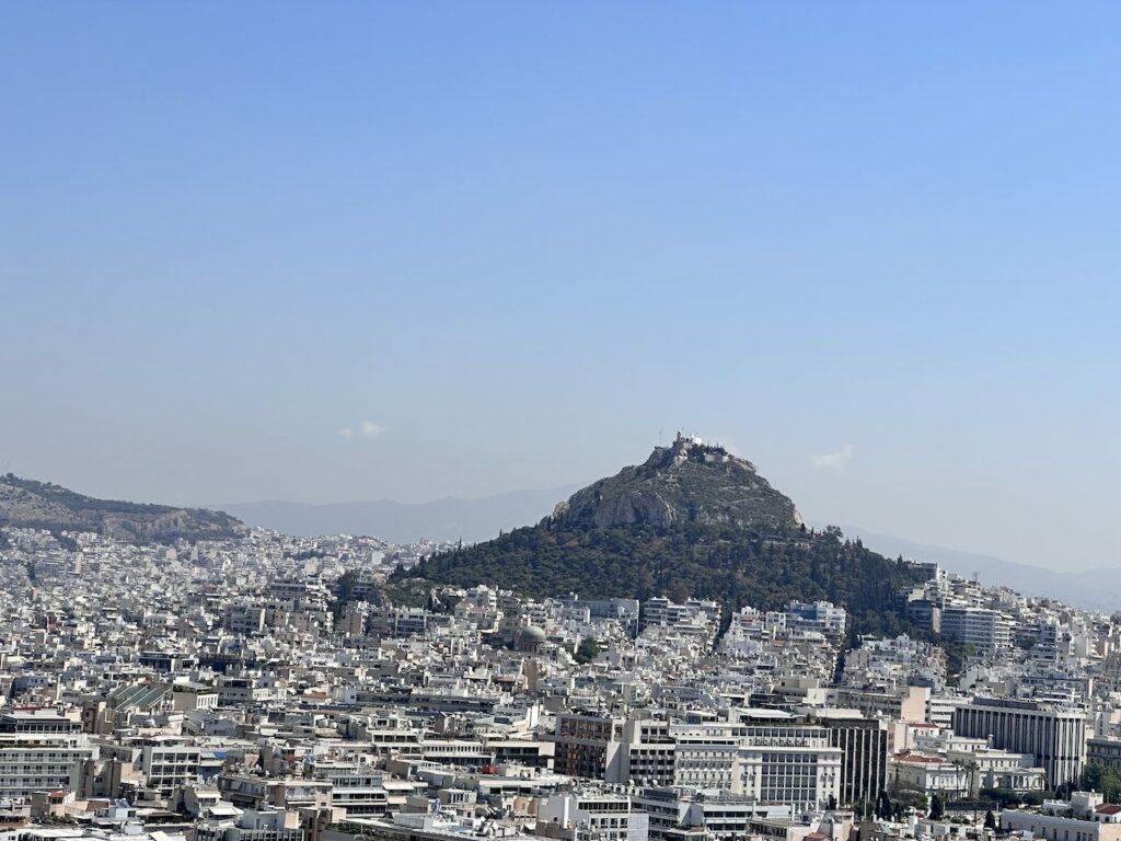 A view of Lycabettus Hill and downtown Athens from atop the Acropolis